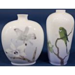 Two Copenhagen vases, one depicting orchids, the other a parrot on a flowering branch