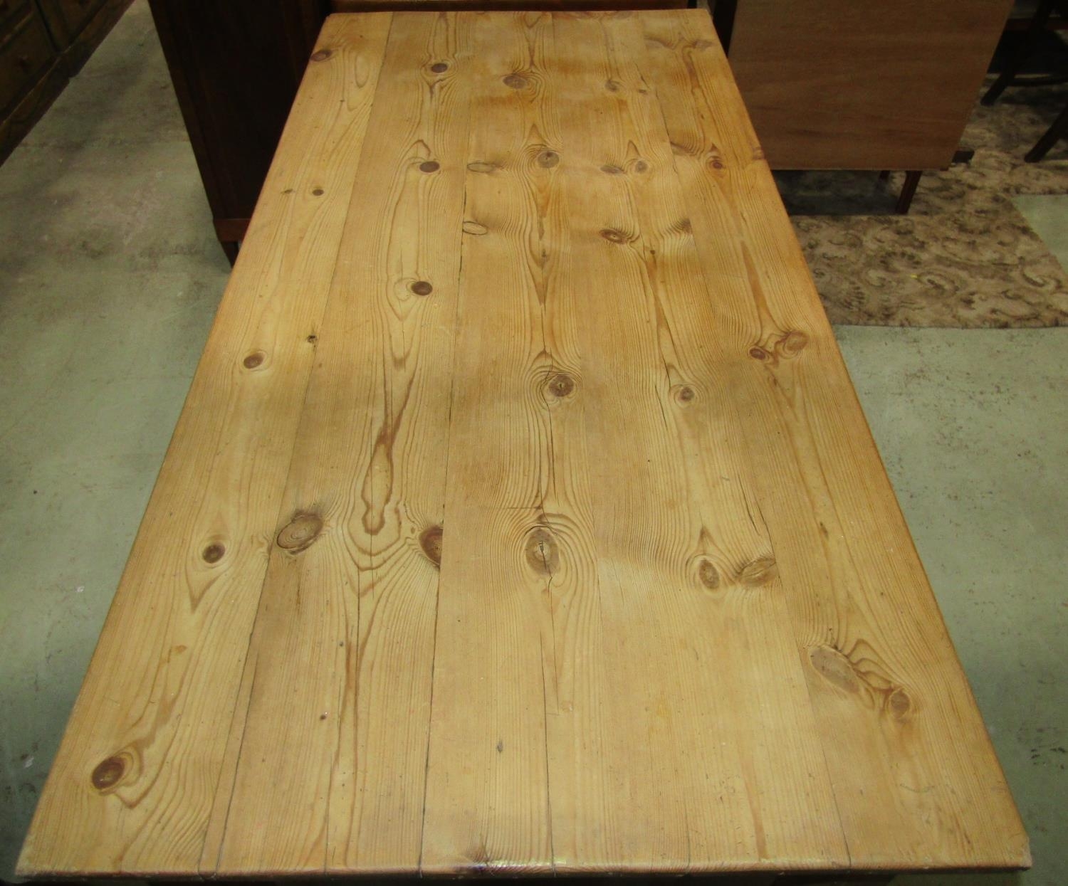 A stripped pine farmhouse kitchen table with rectangular planked top over two frieze drawers - Image 2 of 2