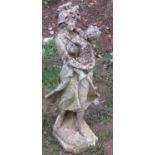 A weathered cast composition stone garden ornament in the form of a maiden and child, 70 cm high