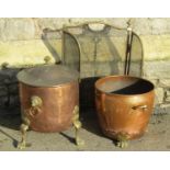 Two vintage copper and brass cylindrical coal bins, varying design, one complete with a lid both