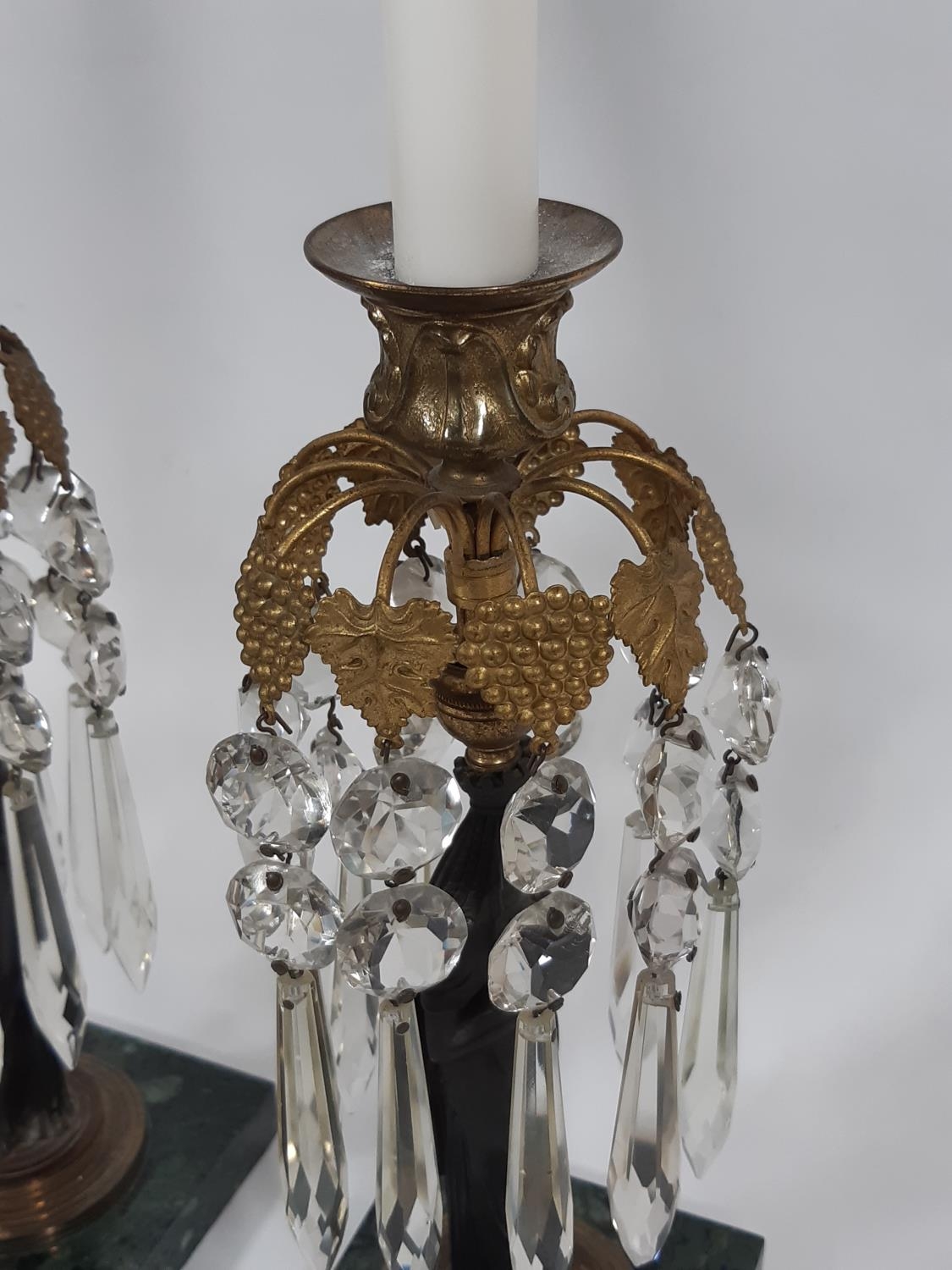 A pair of Regency table candlesticks decorated with ten gilt vine and grape fronds hung with glass - Image 2 of 3