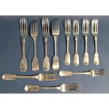 Six Victorian silver fiddle pattern table forks and six Victorian silver fiddle pattern dessert