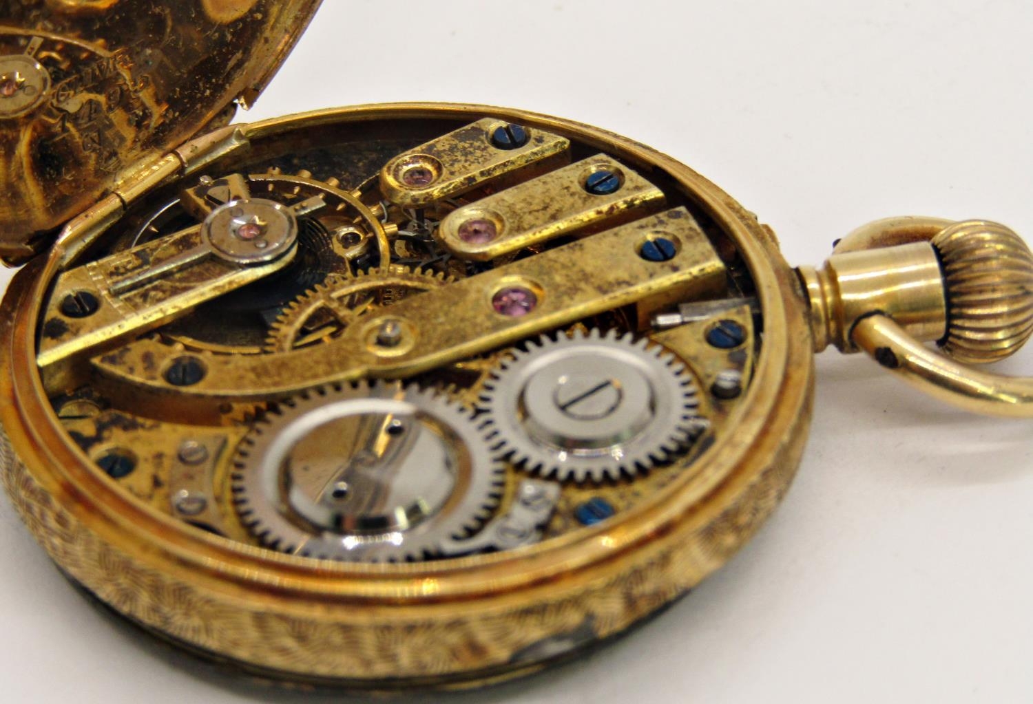 A 19th century continental fob watch with 18k engraved casework and chased dial - Image 5 of 5