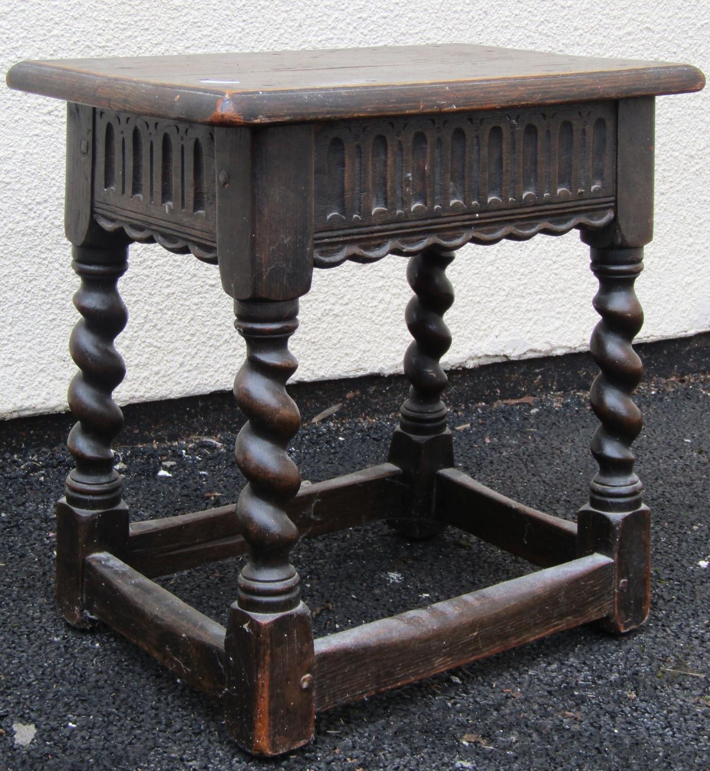 An old English oak joint stool on barley twist supports together with a small walnut and figured