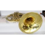 An Italian brass French horn with travelling case