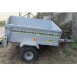A Noval Portaflot two wheeled trailer with galvanised body