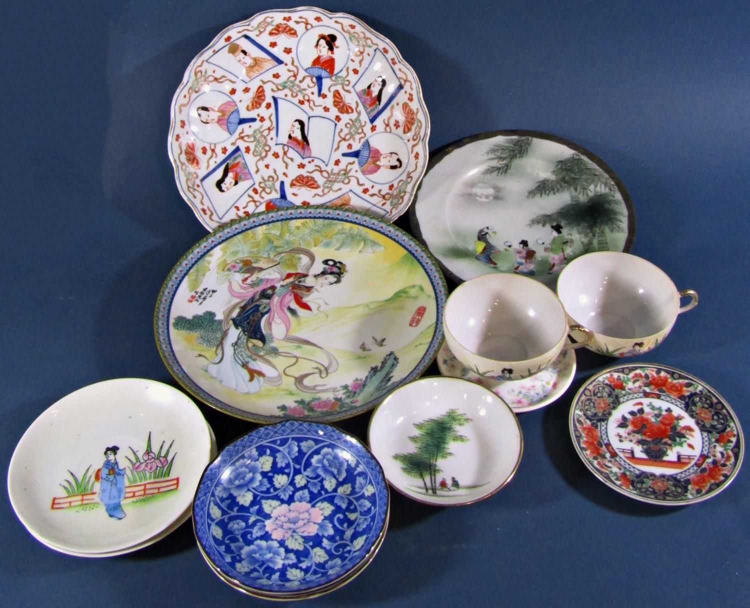 A miscellaneous collection of oriental porcelain including various plate, a pair of seated female - Image 2 of 2