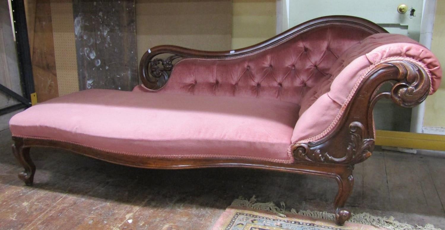 Victorian mahogany chaise longue, the show wood frame with carved and pierced detail, upholstered