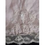 An impressive pair of vintage knickers in pale pink silk, trimmed with 19th century Flanders lace