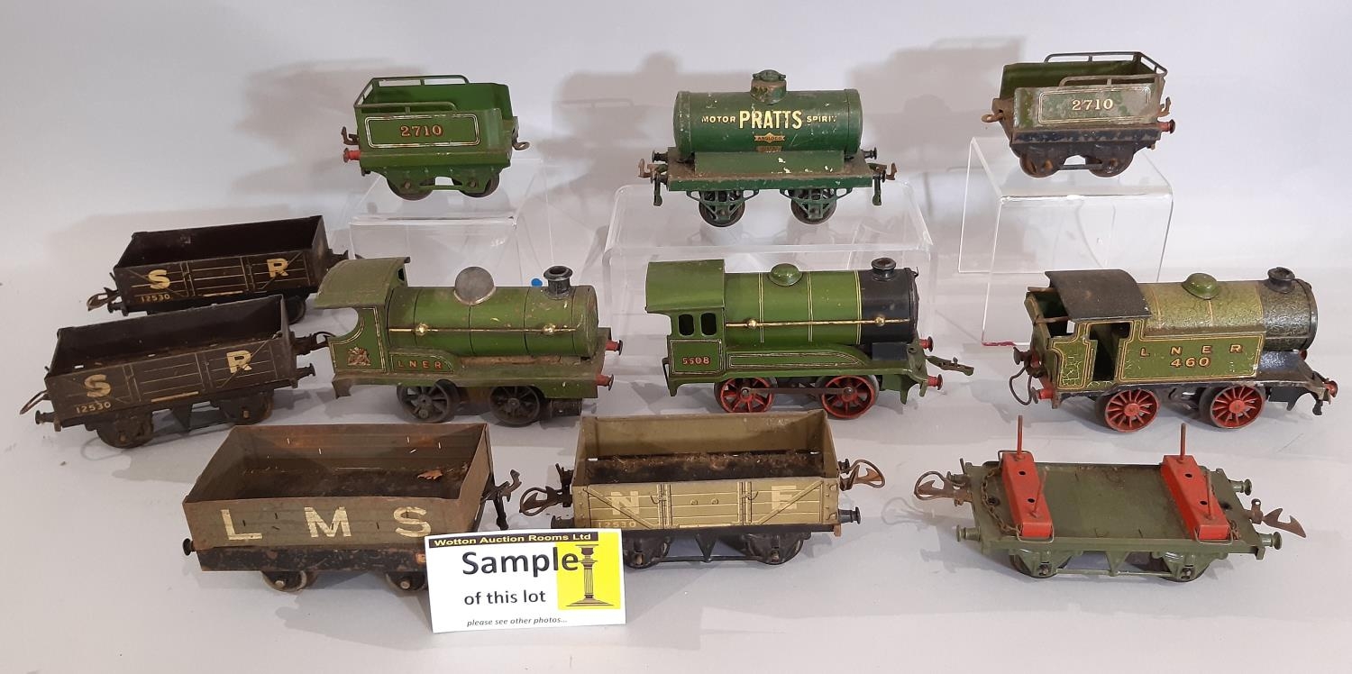 O gauge Hornby railway collection comprising clockwork locomotives, wagons and track; includes 3x