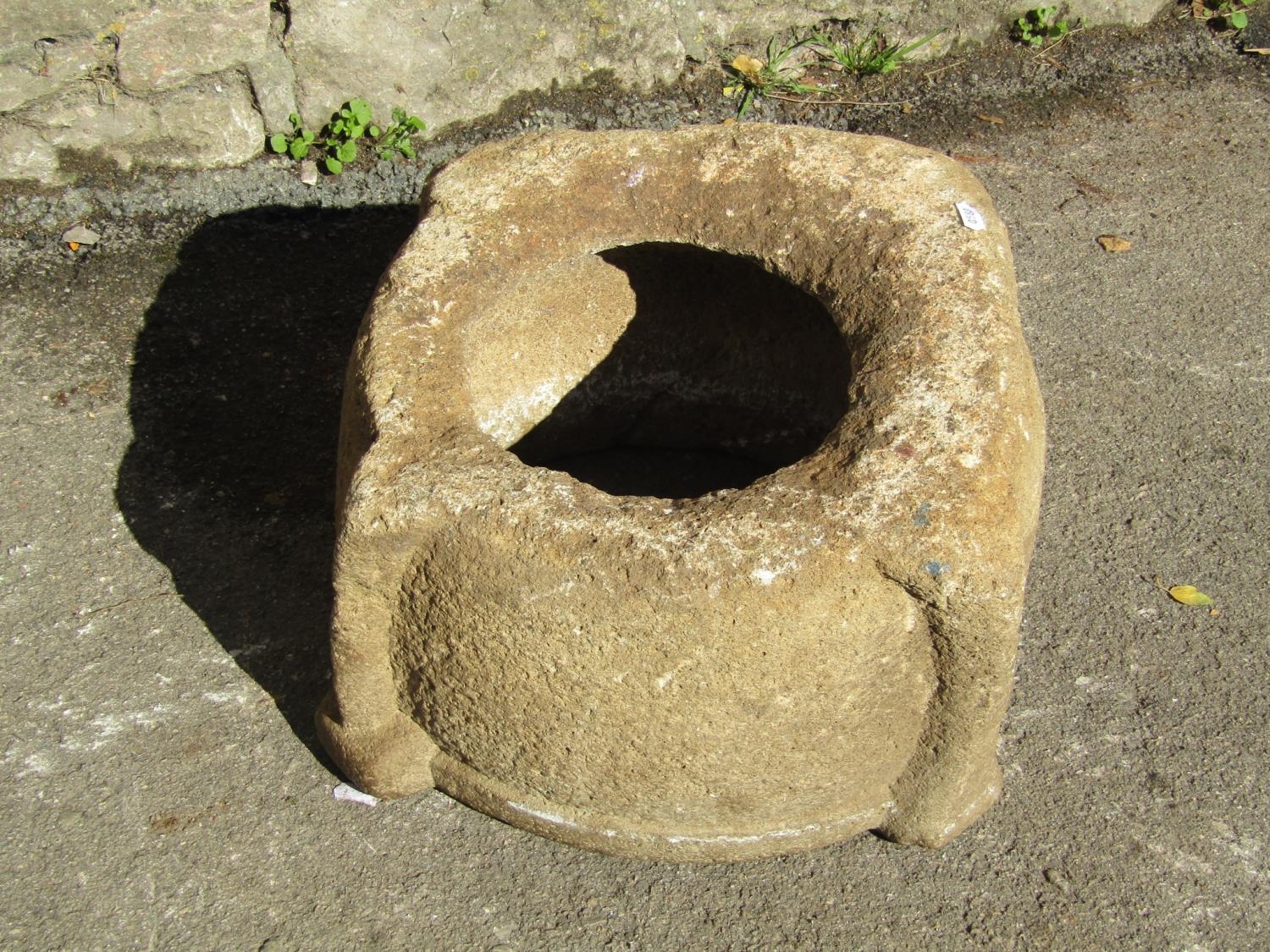 An early weathered carved natural stone mortar/font 40 cm diameter approx x 23 cm high