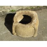 An early weathered carved natural stone mortar/font 40 cm diameter approx x 23 cm high