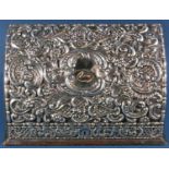 A silver clad Edwardian desk top Moroccan leather stationery box with embossed floral and scrolled