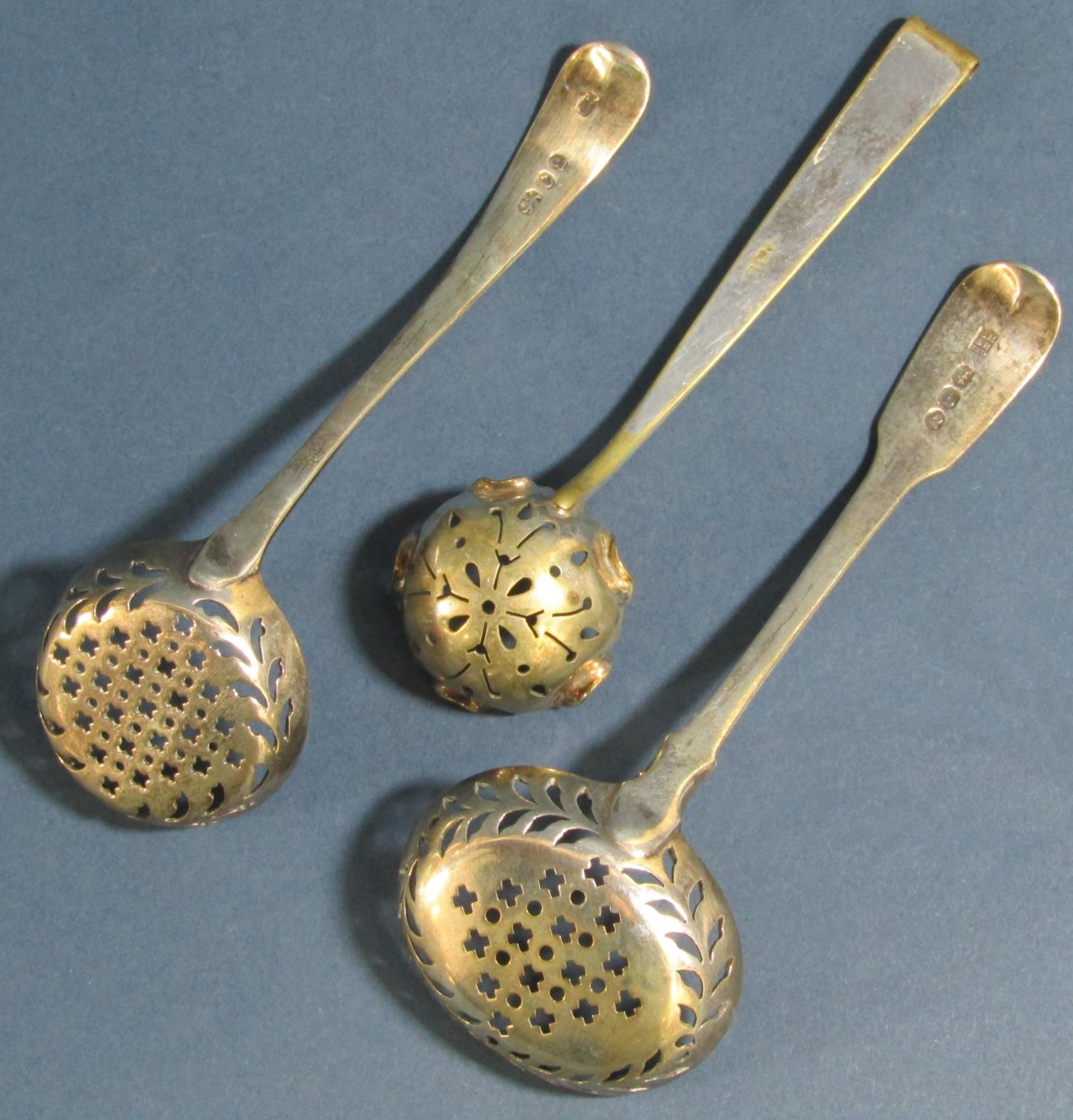 Three silver casting spoons (two Georgian) and two pairs of sugar tongs, 5 oz - Image 3 of 4