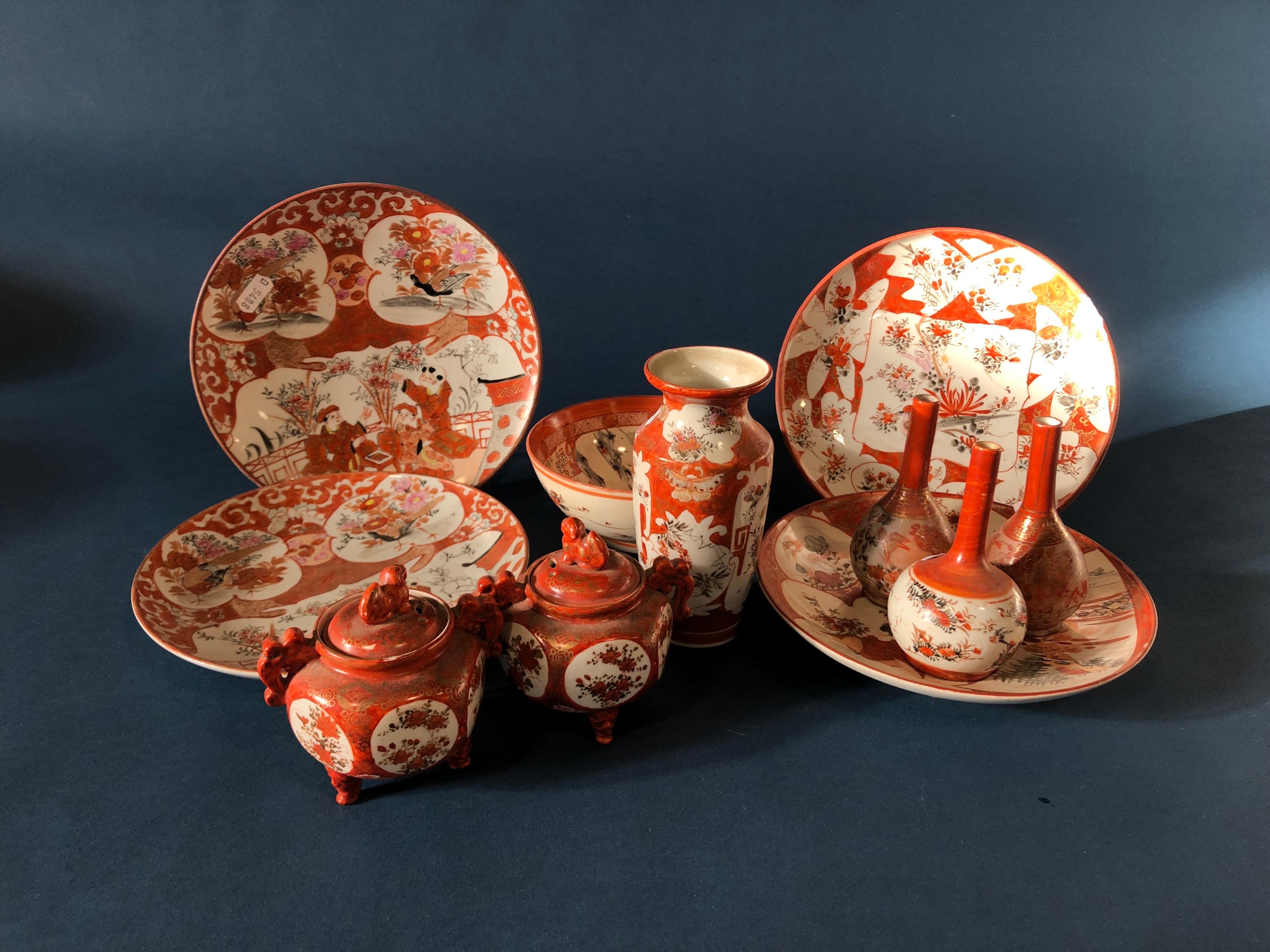 A collection of late 19th century and later Japanese kutani porcelains comprising four dishes, three