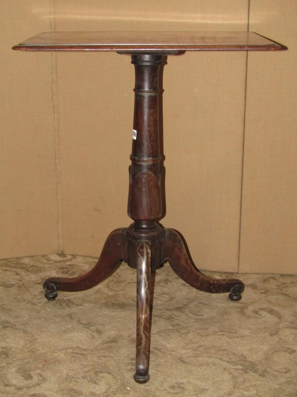 A 19th century mahogany occasional table, the rectangular top with moulded outline raised on a