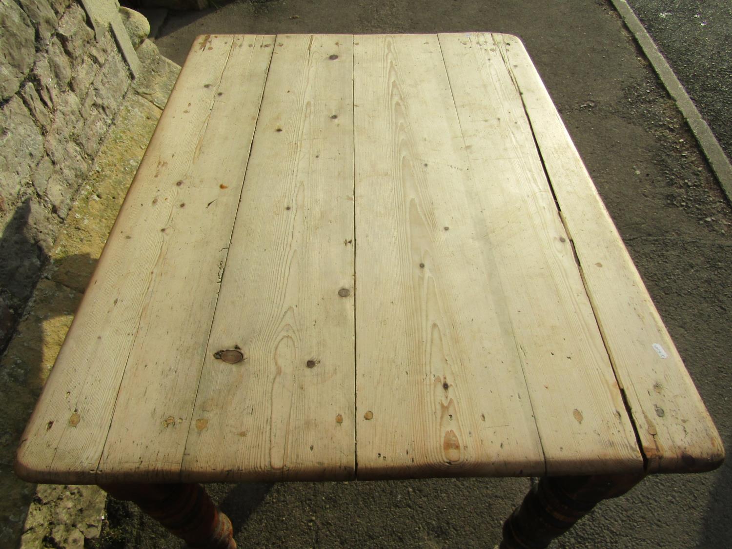 A late Victorian scrubbed pine kitchen table raised on turned supports (lacks frieze drawer, AF) 4ft - Image 2 of 3