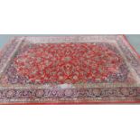 Three machine made Middle Eastern design carpets, including a Marks and Spencer, wool carpet 235cm