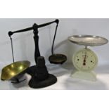 A vintage Raymaster house weighing scale with white enamel finish and an early 20th century shop