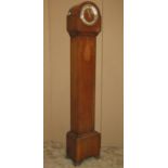 A 1920s/30s oak cased grandmother clock with three train movement and silver chapter ring
