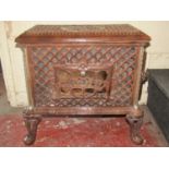 A French enamelled wood burning stove - Chauffette with brown enamelled detail, pierced grills and