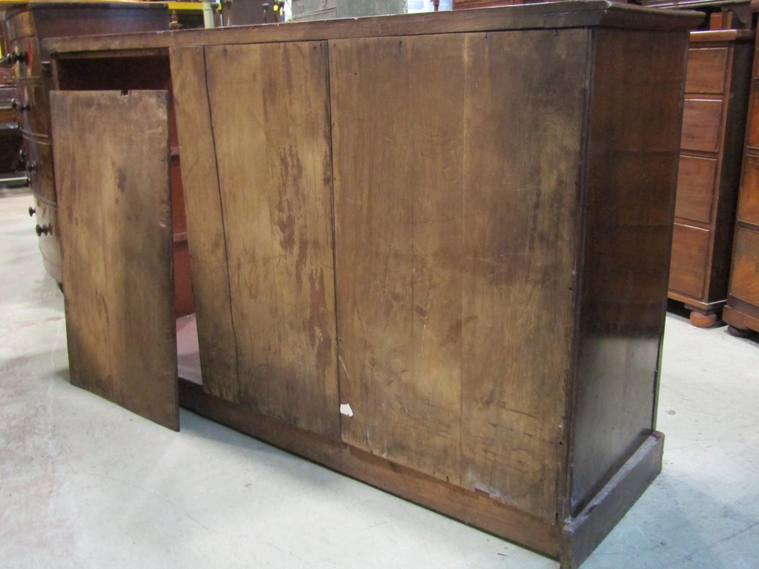 A Victorian mahogany linen cupboard enclosed by three moulded rectangular arched panelled doors, the - Image 3 of 4