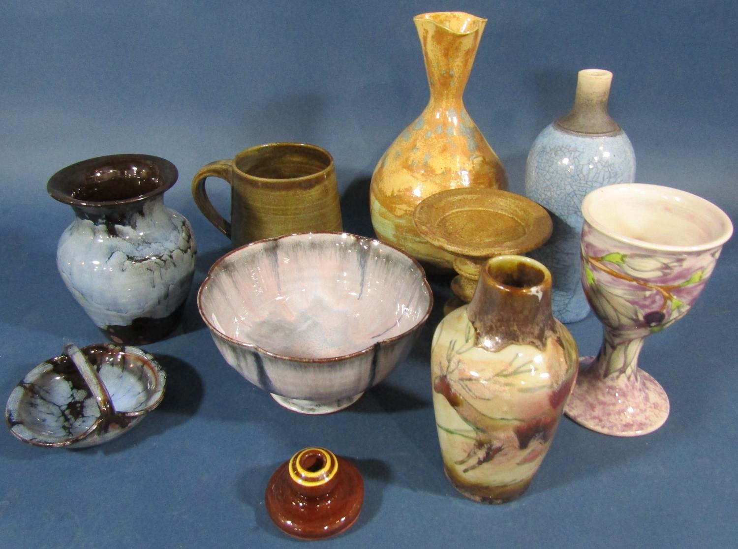 Collection of studio pottery vases and bowls with blue and brown glaze to include vase with