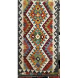 A Chobi Kilim Runner with a central row of five stepped diamonds 214cm x 67cm approx.