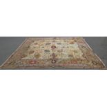 A large old worn and torn Donegall type carpet with a large floral pattern (af) together with others