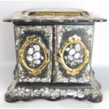 A 19th century black lacquer and mother of pearl cabinet with drawers to the interior. 30cm wide x