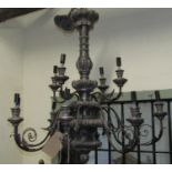 Two tier 12 branch chandeliers with acanthus leaf and other detail, 70cm high x 100cm wide approx