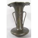 An early 20th century Art Nouveau bronze vase with a floral flared rim and Lily pad handles 22cm