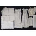 Small collection of late 19th/ early 20th century textiles including 3 white cotton baby gowns,