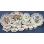 A collection of Portmeirion Botanic Garden china comprising dinner plates, tea plates, dishes, toast