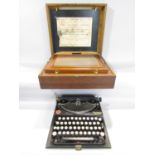 A Remington portable typewriter, purchased 27th October 1927, together with a Calesco copier of