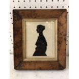 English School, 19th Century - silhouette of a lady, paper-cut with gilt details, 20 x 17.5 cm (