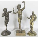 Three Grand Tour bronzes, The Faun of Pompeii, 15cm, Pan playing pipes, 13cm and Narcissus, 11cm.