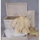 Vintage wicker trunk with satin lining, castors and internal removable shelf, filled with baby