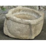 A early carved stone morter/font 40cm in diameter approximately x 23 cm high