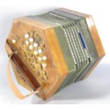 A Concertina, in working order, Made in Germany.