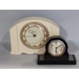 An art deco bedside clock with eight day time piece, together with one other by Smith's in a white