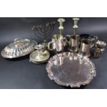 A selection of silver plated tableware including tureen, a pair of slender candlesticks, tankards, a