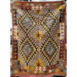 A Chobi Kilim with a broad multicoloured all over diamond pattern 142cm x 108cm approx.