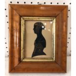 English School, 19th Century - silhouette of a lady, paper-cut with gilt details, 16 x 19 cm (