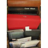 A box containing several albums of British stamps, mainly mid-20th century and later, some mint,