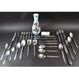 A quantity of loose cutlery, most matching and a pale blue West German glass floral decorated vase.