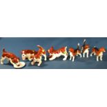 A collection of Beswick dogs, miniature hounds and terriers (7)
