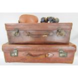 Two vintage brown leather suitcases and a pair of Rank Aldis binoculars 7 x 50 in a case, strap