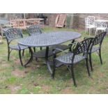 A painted cast alloy D end garden table with pierced lattice top, 180 cm x 106 cm together with a