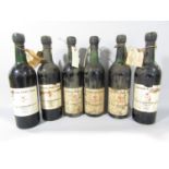 Six bottles of Graham & Co vintage port wine comprising three bottles of 1966 Finest Reserve and